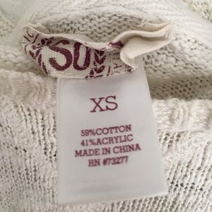 Cream long sleeved sweater